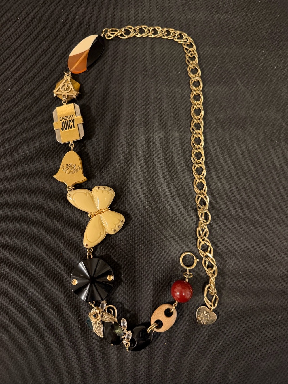 Juicy Couture Gold-Tone Necklace with Black, Cream and Red Charms